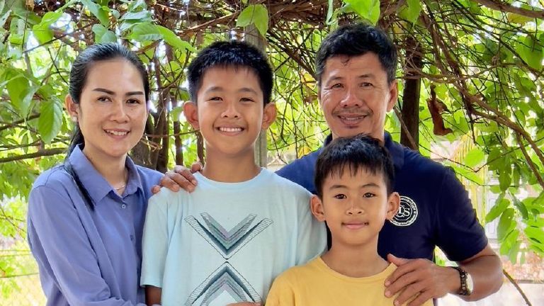 ACD Homestay family smiling together